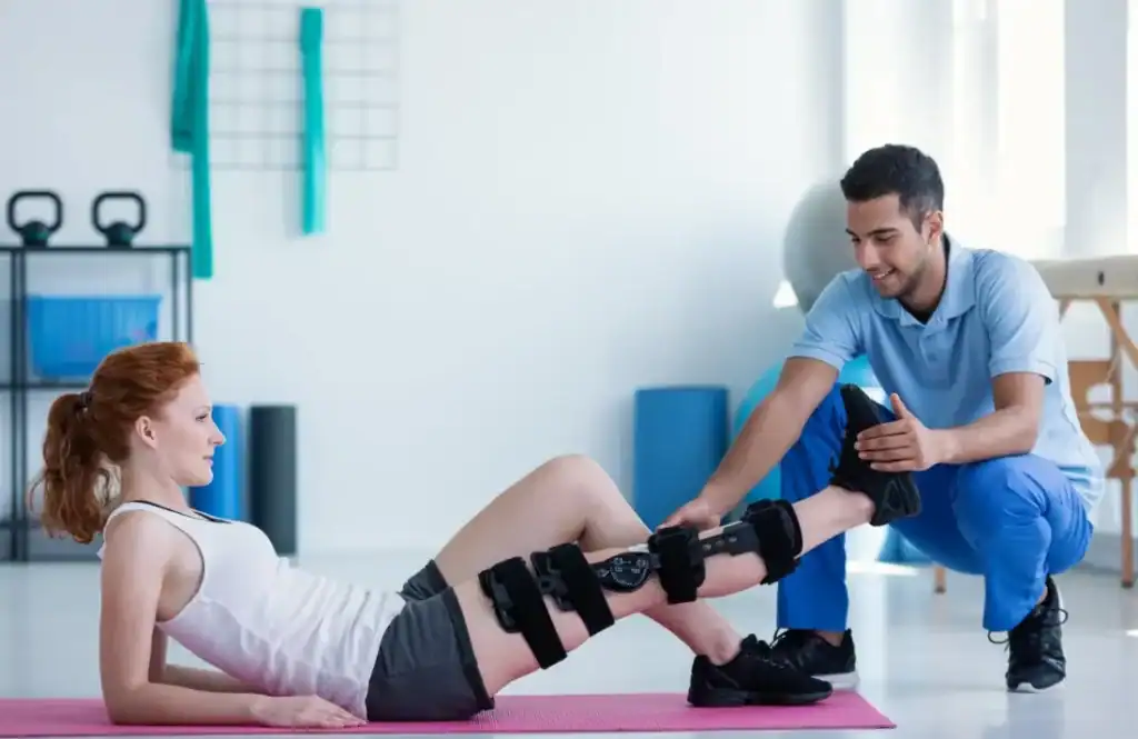 Debunking Meal Timing Myths: The Truth About Muscle Recovery 1 Woman having treatment to help muscle recovery Uckfield after an injury